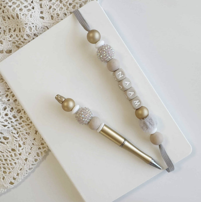 Notitieboekje-en-pen-met-naam
