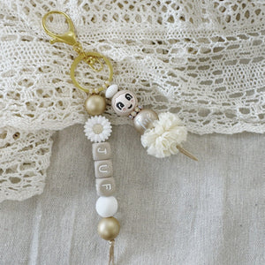Sleutelhanger-met-naam-gouden-poppetje-juf
