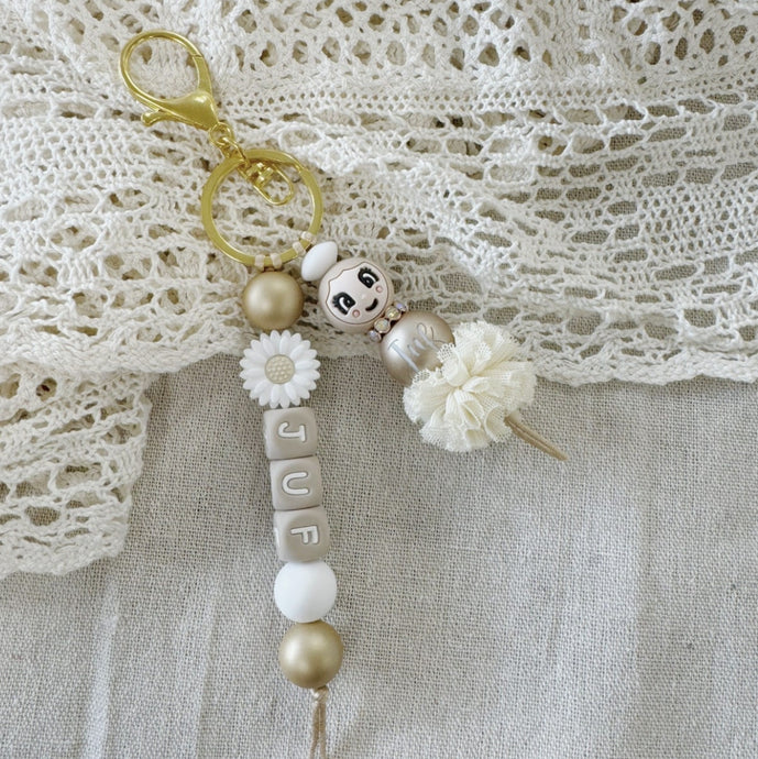 Sleutelhanger-met-naam-gouden-poppetje-juf
